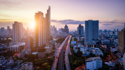 Wall Mural - aerial view of bangkok skyline panorama and skyscraper with light trails on sathorn road center of b