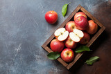Red apples in wooden box