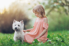 Little Girl With A Dog Outdoors