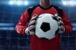 © fotokitas - Soccer goalkeeper holding soccer ball