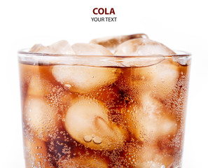 Cola in glass with straw and ice cubes isolated on white background. Soda with bubbles isolated on white. Refreshing non-alcoholic drink