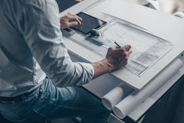 Young architect in the workplace