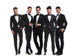 © Viorel Sima - five handsome men in black tuxedoes standing together