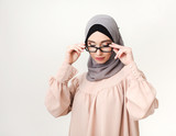 Fototapeta  - Trendy eastern woman in hijab and glasses