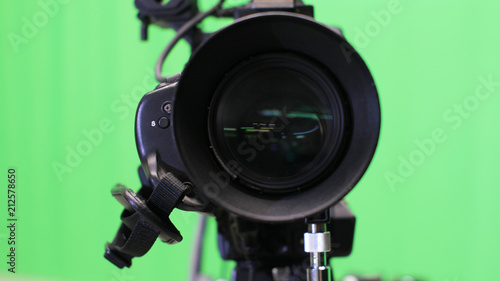 TV Camera In The Studio With Green Screen Background News And Broadcasting Concept TV Camera In The Studio With Green Screen Background News And Broadcasting Concept