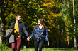 © be free - Couple in love walks in autumn park. Relationship and fall