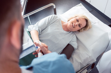 Poster - Doctor greeting patient before starting treatment in hospital