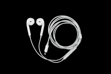 earphones on black background.