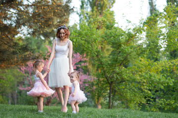 a woman and children in nature