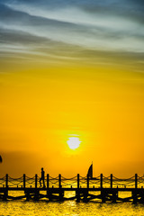 Wall Mural - sun sea tropical sunset view of the pier of the caribbean