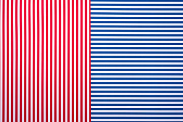 Wall Mural - top view of blue and red surface with white stripes for background