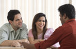 © IndiaPix - Couple receiving financial consultation