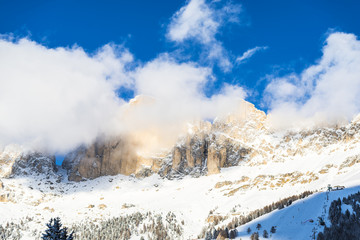 Wall Mural - Winter Clouds in Dolomites Mountains 