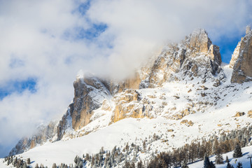 Wall Mural - Winter Clouds in Dolomites Mountains 