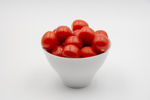 Group Of Cherry Tomatoes In White Bowl Isolated On White Background With Clipping Path