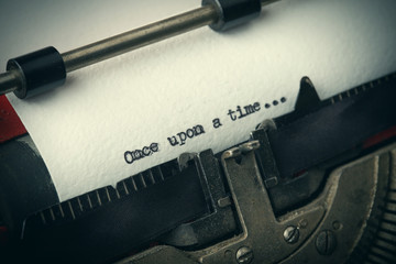 Poster - Close up of old typewriter covered with dust with Once upon a time text