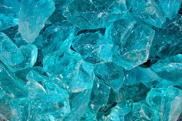 A pile of cyan glass rock.