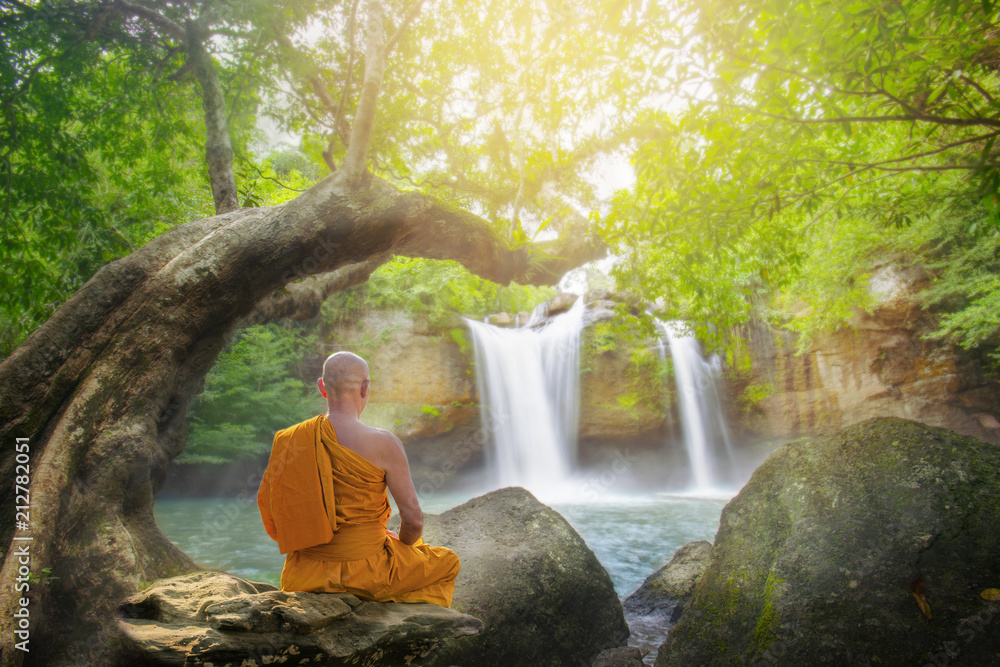 monk practice meditation at haew suwat waterfall in thailand,Khao Yai national park ,Thailand - obrazy, fototapety, plakaty 