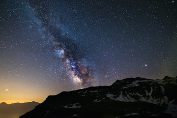 Wall Mural - astro night sky, milky way galaxy stars over the alps, mars and jupiter planet, snowcapped mountain 
