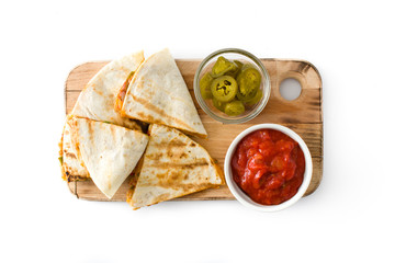 Mexican quesadilla with chicken, cheese and peppers, isolated on white background. Top view