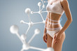 Woman with perfect body near molecule chain.