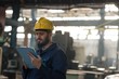 © Wavebreak Media - Technician maintaining record on clipboard