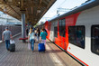 Kursk station. Passengers enter the high-speed train on the first platform