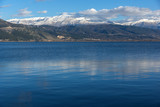 Fototapeta Natura - Amazing winter Landscape of Lake Pamvotida and Pindus mountain from city of Ioannina, Epirus, Greece