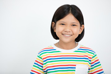 Asian girl smiling enthusiastic and looking at camera.