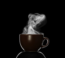 Cup With Hot Drink, Steam Over Cup, Isolated On Black