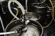 Many metal kegs of beer in beer plant. Bottling beer. Kegs upon kegs at a brewery