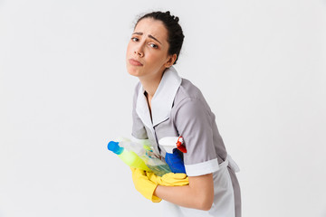 Wall Mural - Portrait of a sad young housemaid