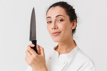 Wall Mural - Portrait of a pensive young woman cook