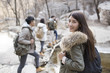 © Blue Jean Images - Portrait of cheerful young Chinese woman outdoors in winter