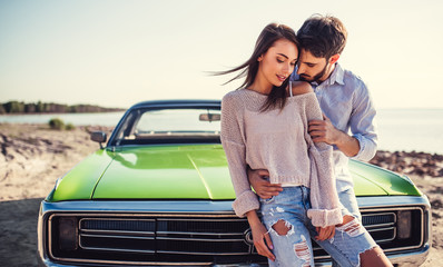 Couple with retro car