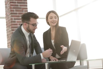 Two coworkers working on new business strategy