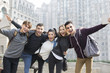 © Blue Jean Images - Cheerful abroad students on campus