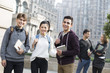 © Blue Jean Images - Cheerful abroad students on campus