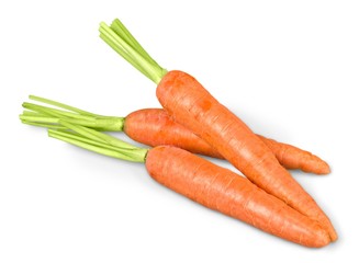 Fresh carrots on a white background