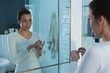 © Wavebreak Media - Woman standing in bathroom