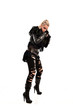 © faestock - full length portrait of blonde girl wearing torn black feather costume. standing pose, isolated on white background.