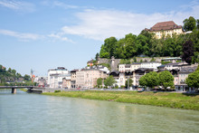 Historic Salzburg Seen From The Karolinen Bridge Over The Salzach River. 