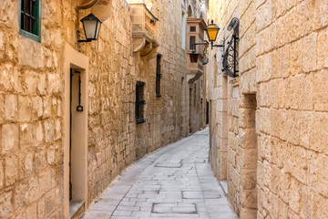 beautiful view of ancient narrow medieval street town Mdina, Malta