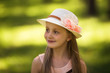 © viclin - Summer vacation - Portrait of lovely girl  in a straw hat in the park