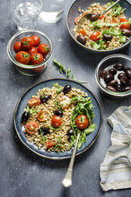 Farro Spelt Salad With Cherry Tomatoes,black Olives And Arugula