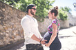 © Louis-Photo - Pregnant couple portrait outside in the neighborhood