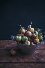 Organic Apples And Pears In A Rustic Bucket