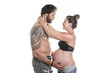 © Louis-Photo - Young pregnant woman with husband isolated on white