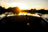 Fototapeta Londyn - Fishing boat and beautiful sunset