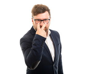 Wall Mural - Portrait of business man showing watching you gesture.